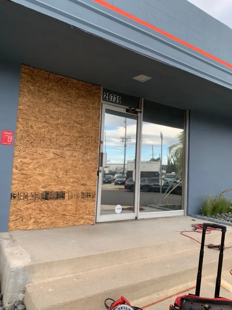 Building with boarded window