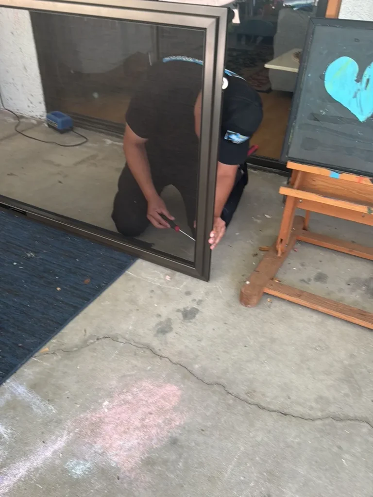 Emergency glass door repair for a broken patio door panel at a local HOA property.