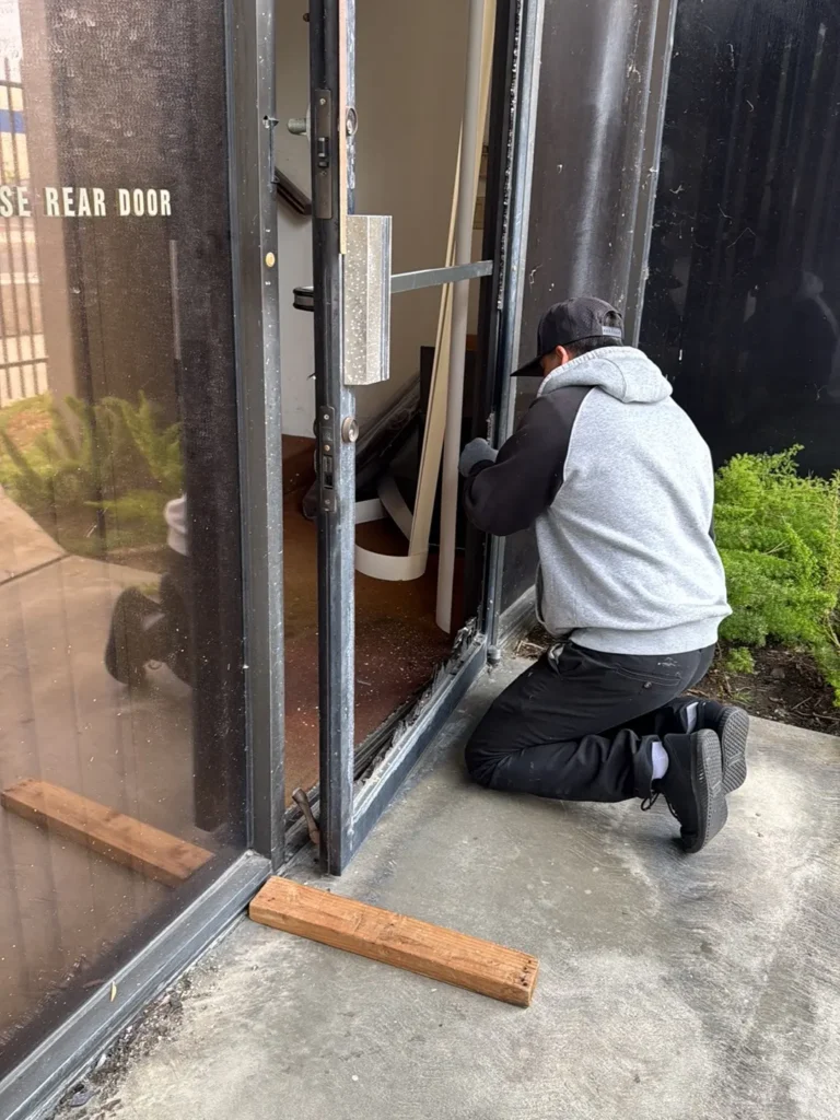 Cracked patio door glass replacement for an apartment building entrance in Canoga Park.